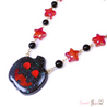 spooky glow jack o lantern necklace black close